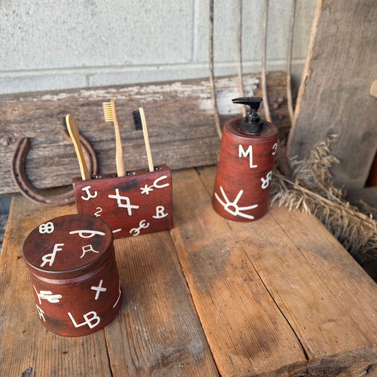 Bathroom set - toothbrush holder, soap dispenser and canister.