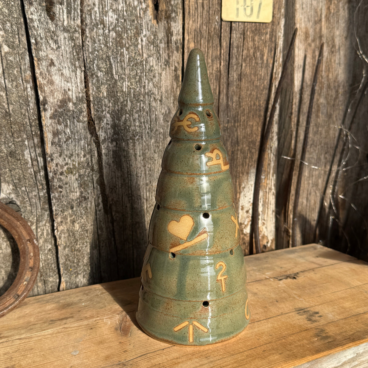 Branded Luminary Christmas tree and cowboy hat tree topper