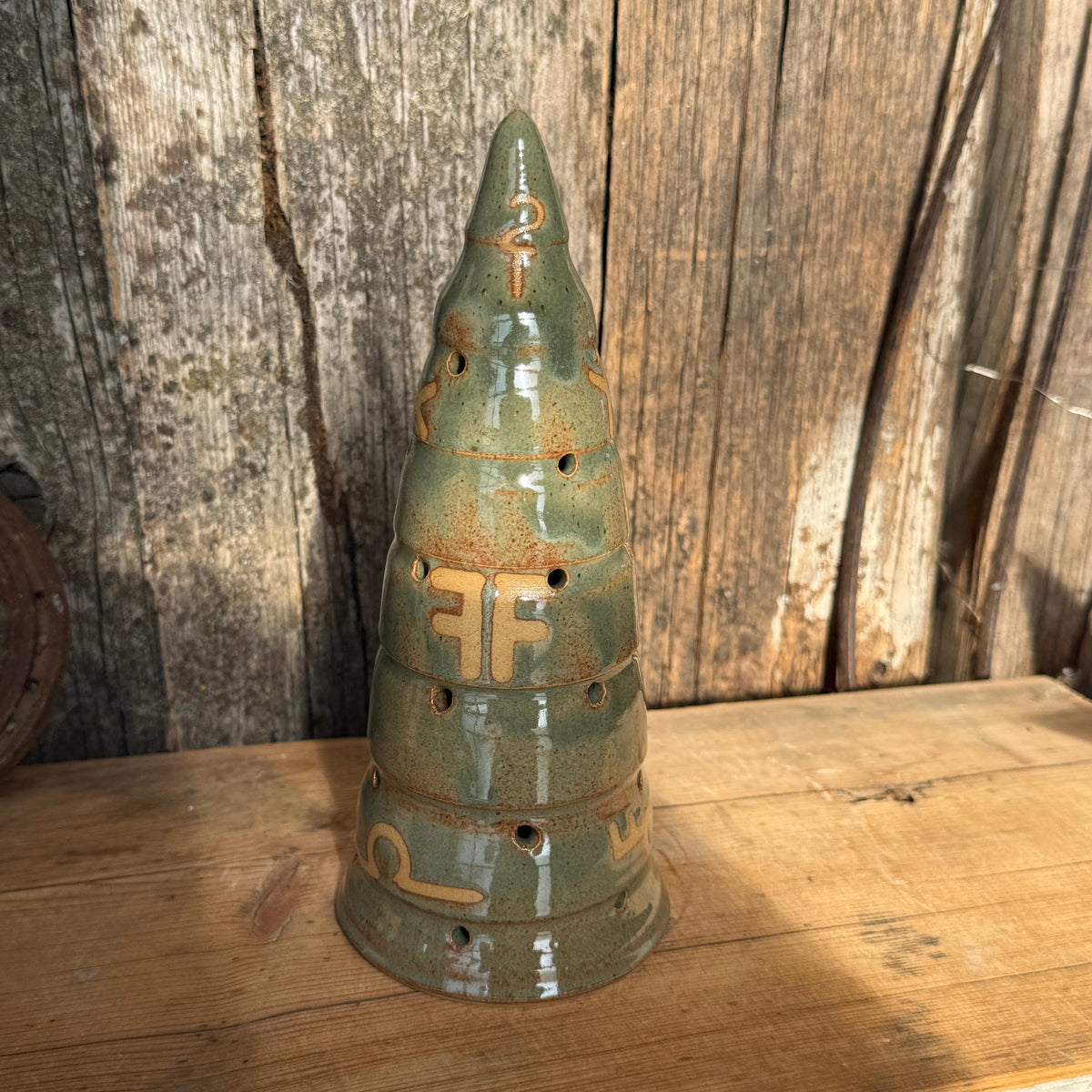 Luminary Christmas tree and cowboy hat tree topper