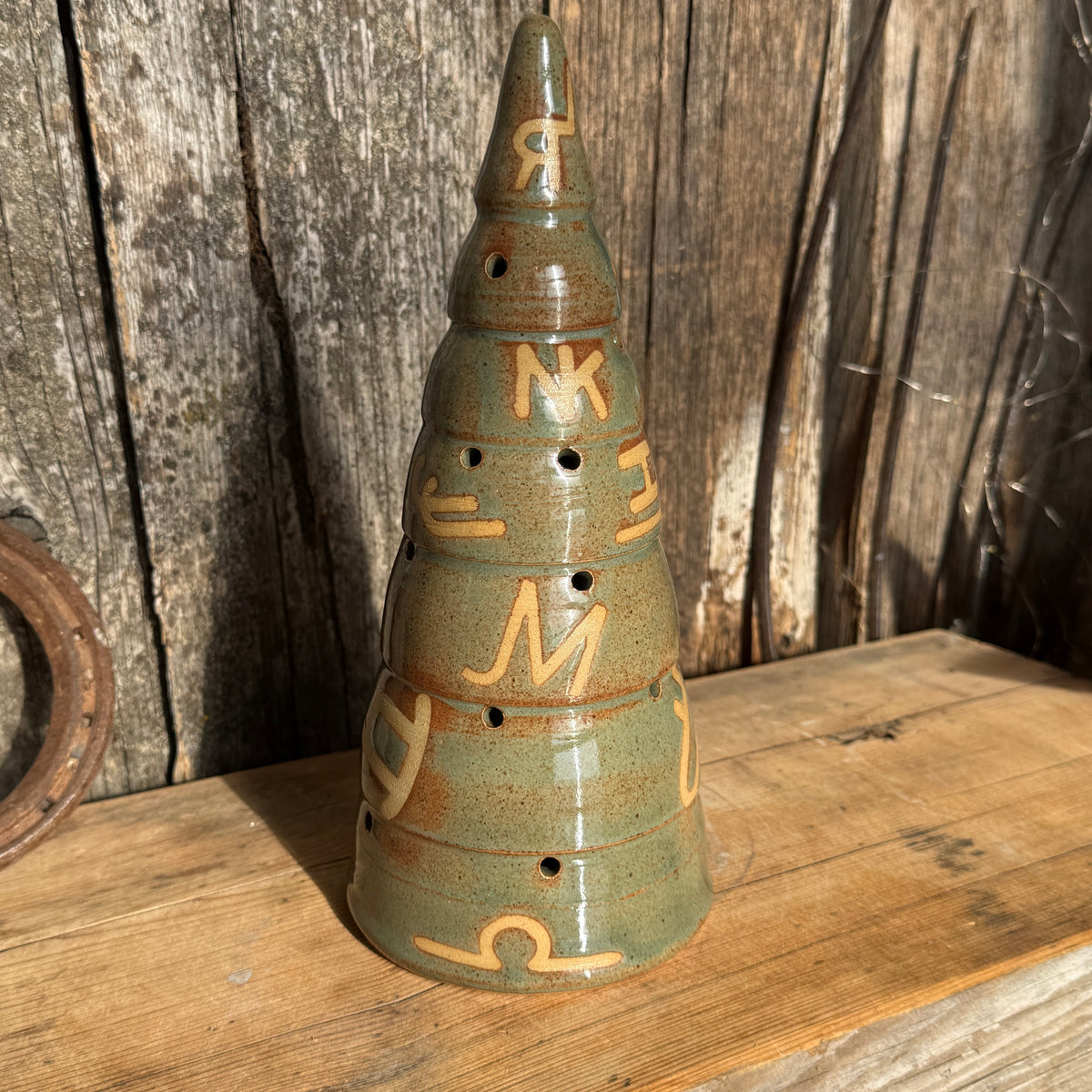 Branded Luminary Christmas tree and cowboy hat tree topper